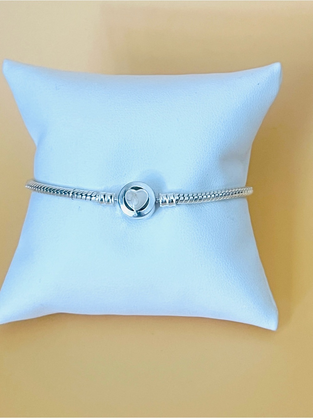Silver plated bangle bracelet with enamel heart clasp